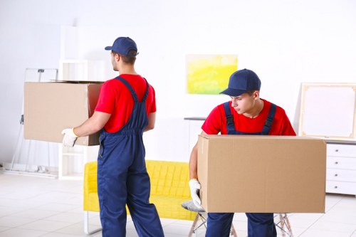 House removalists loading furniture for a home move in Welling