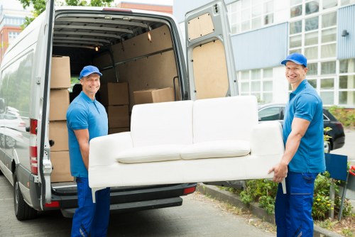Moving team preparing items safely for transport