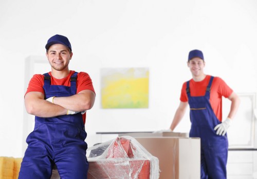 House movers loading furniture for a home move in Welling