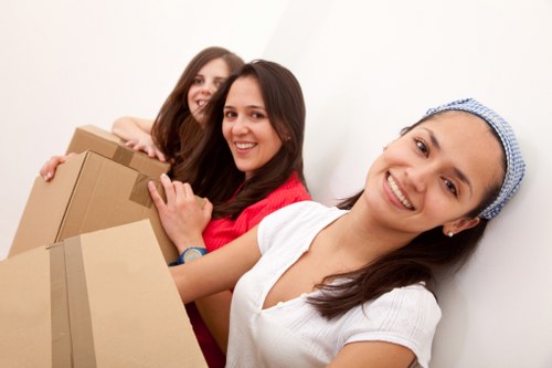Packed boxes and household items ready for a man with van removal