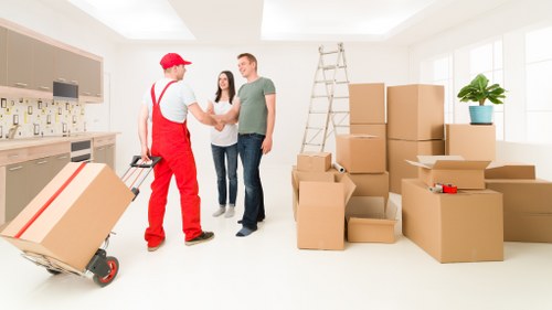 Packed moving boxes prepared for a local move in Welling
