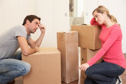 Professional removal team loading items for a move in Welling