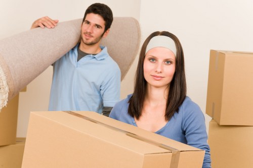 Packed moving boxes and protective wrapping for a local house relocation