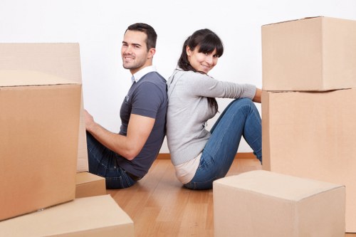 Moving van and boxes for a Welling property relocation